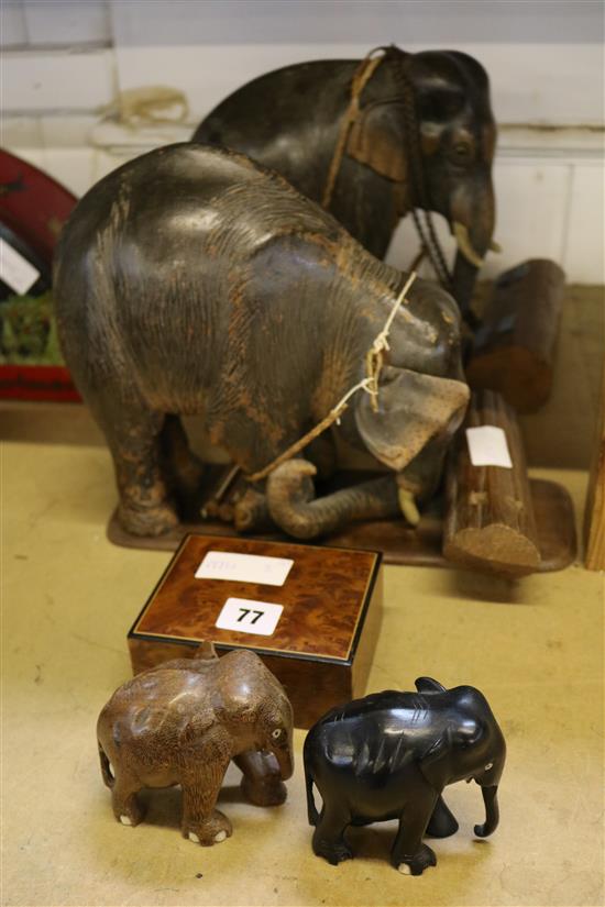 2 x carved wooden elephants, 3 smaller elephants and a burr walnut box